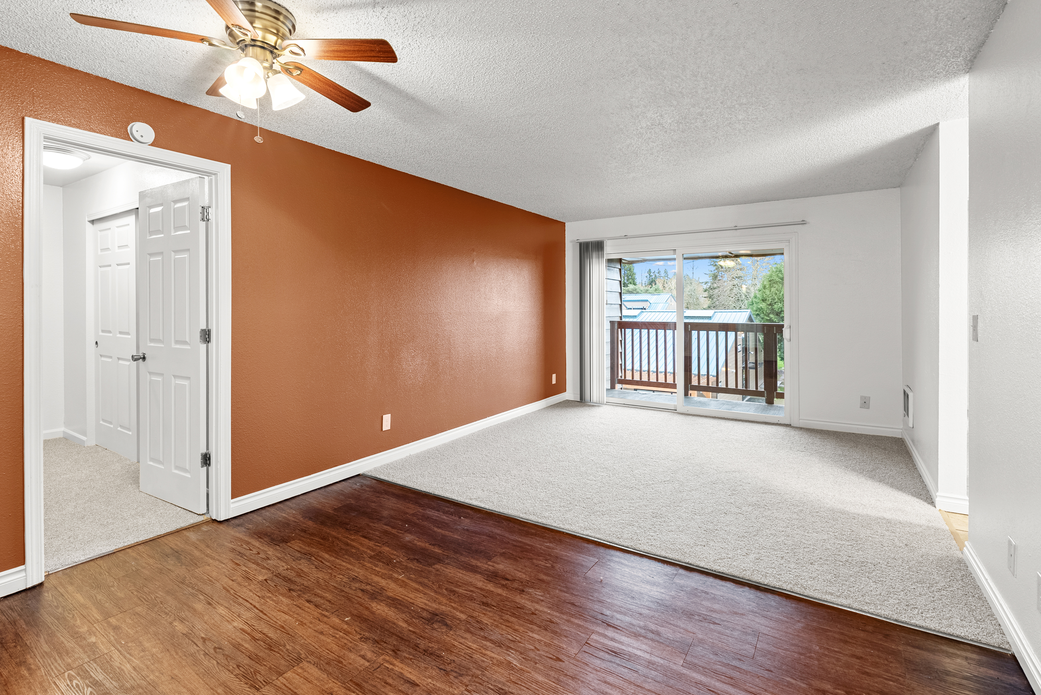 Portland apartment living room orange accent wall interior photography